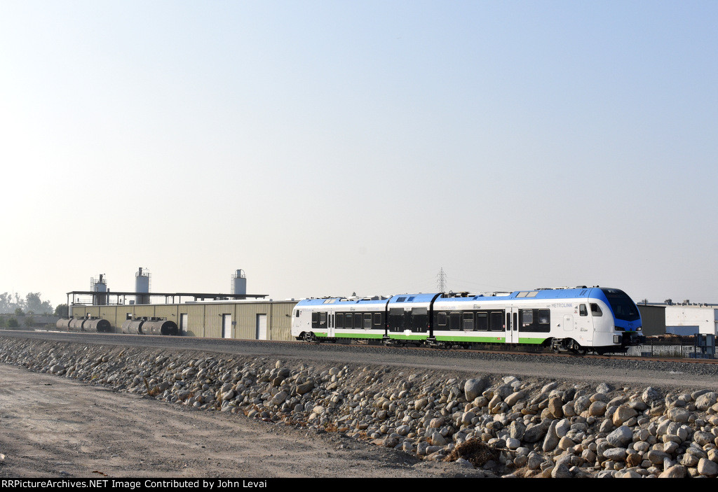  Eastbound single Arrow Stadler DMU consist approaching San Bernardino Tippercanoe Station